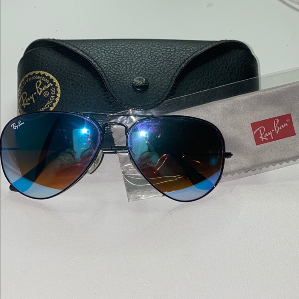 Ray bans with a blue tint